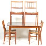 A vintage retro 1970's Jentique teak wood extending dining table together with four Portwood retro