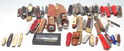 A large collection of vintage retro 20th century penknife and hunting knives to include Swiss