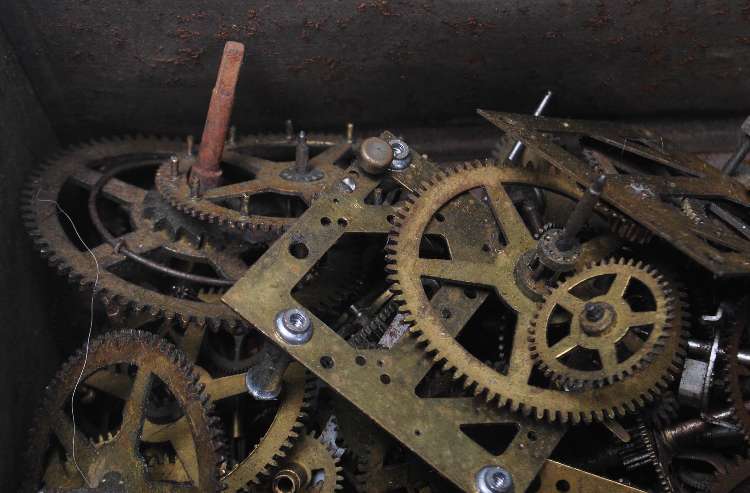 A collection of antique / vintage clock spare parts to include clock fusee movement parts, gear - Image 4 of 5