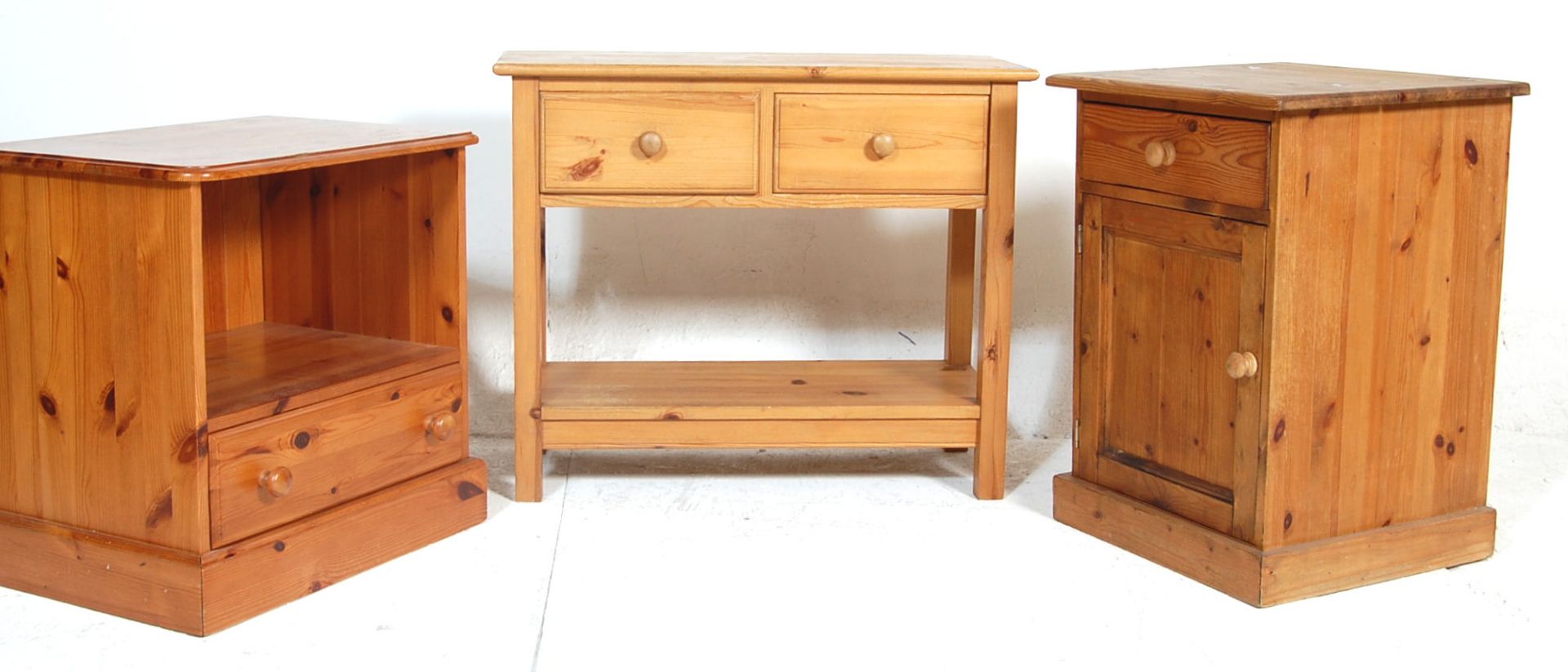 A collection of 20th Century pine furniture to include a single door cupboard with a turned knob