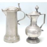 Two 18th Century pewter wine tankards having scroll handles and beak shaped spout with makers mark