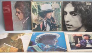 A collection  of vinyl long play LP record albums by Bob Dylan to include Highway 61 Revisited, More