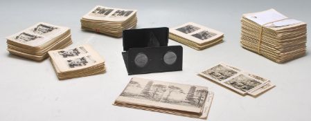 An mid 20th Century stereoscopic slide viewer along with a large quantity of stereoscope views