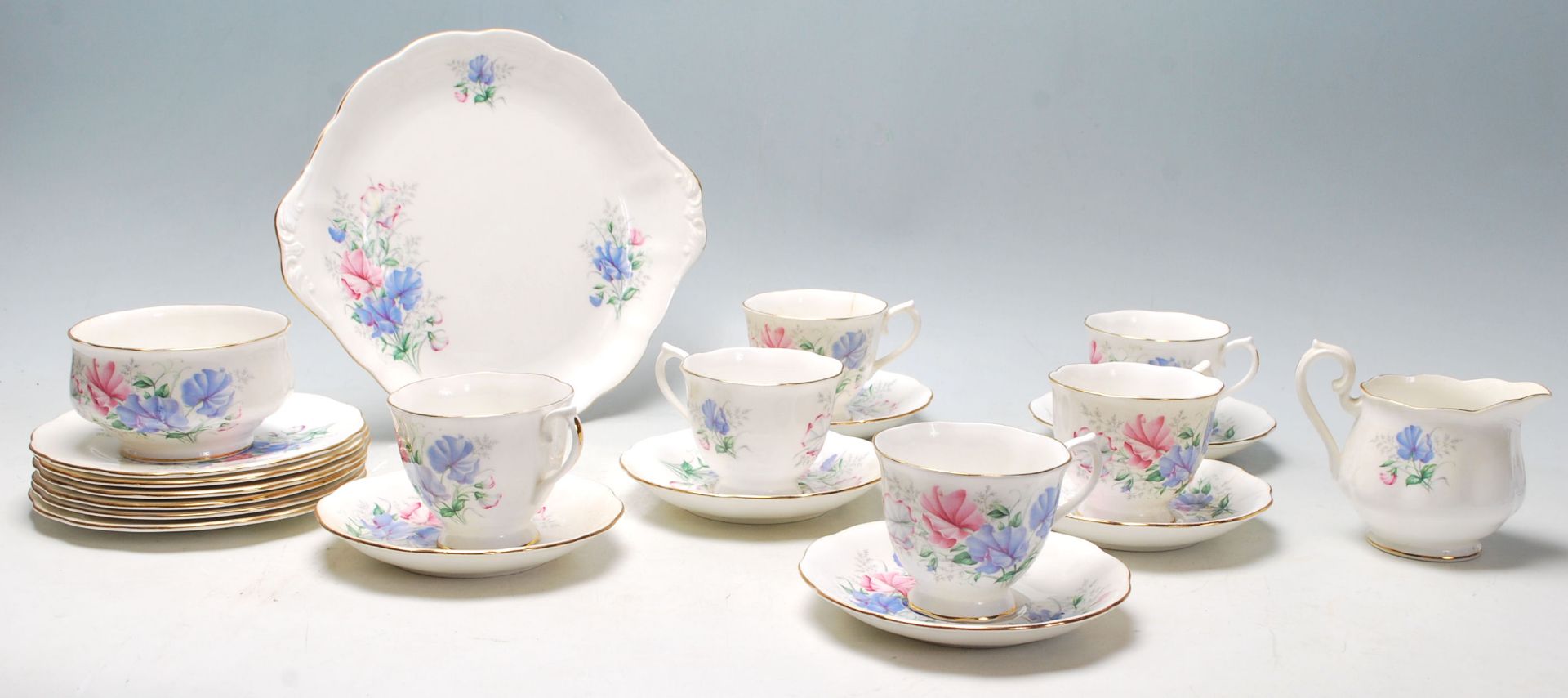 A Royal Albert Friendship Sweet Pea pattern fine bone china tea set comprising of 6 tea cups,