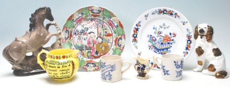 A collection of antique ceramic items to include a Mason's ironstone plates to include one decorated