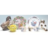 A collection of antique ceramic items to include a Mason's ironstone plates to include one decorated