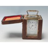 A 20ty Century French Brass and glass carriage clock are having white enamel face, Roman numerals