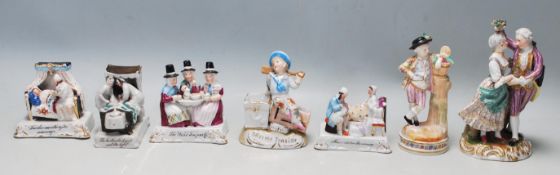 A collection of 20th Century German ceramic figurines to include five fairing type figures including