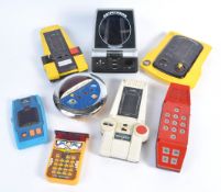 COLLECTION OF VINTAGE 1970'S HANDHELD COMPUTER CONSOLES