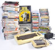 LARGE COLLECTION OF COMMODORE 64 VIDEO GAMES AND CONSOLE