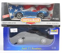 TWO ORIGINAL 1/18 SCALE DIECAST MODEL AUDI TT AND SHELBY COBRA