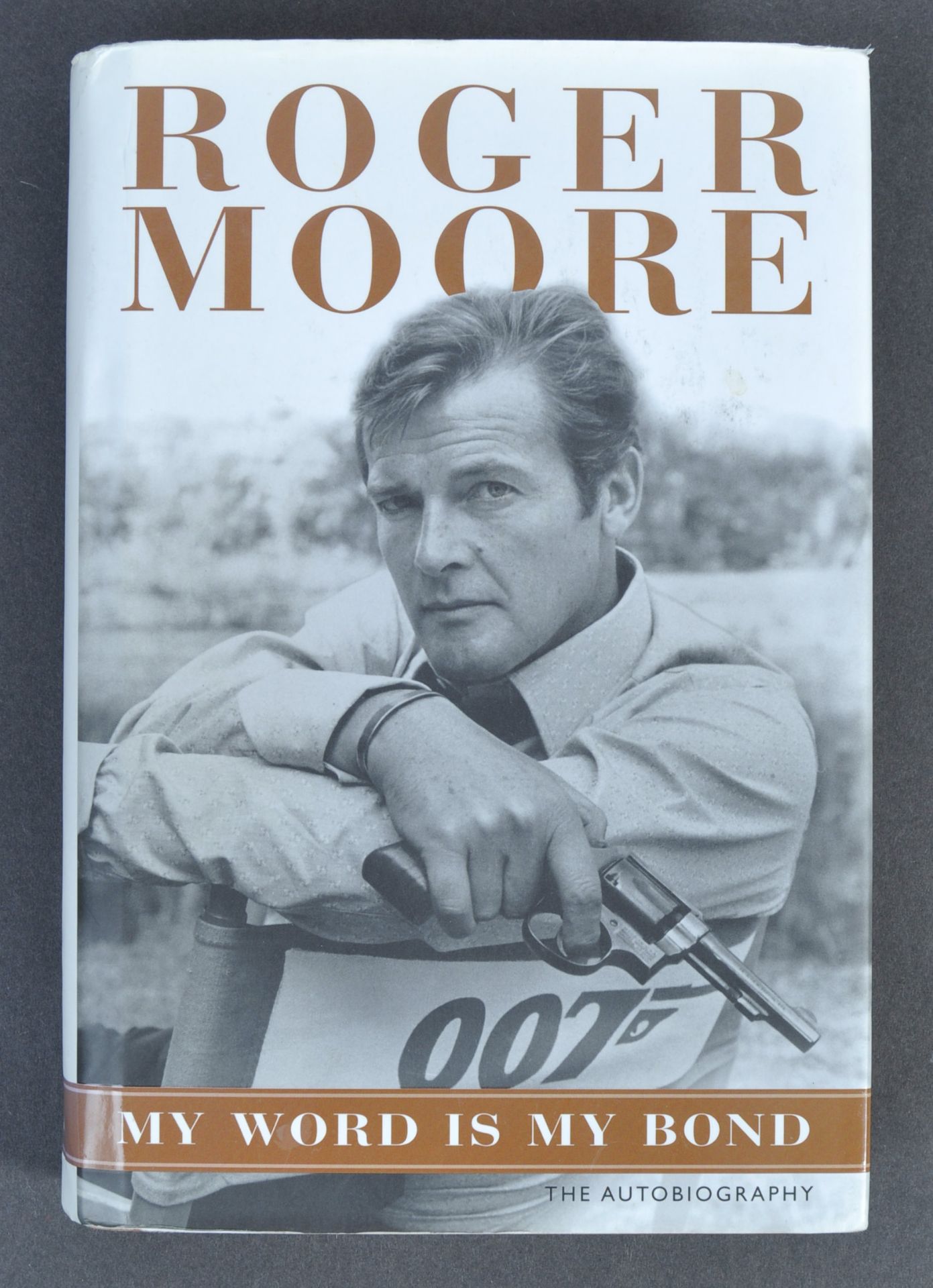 ROGER MOORE - JAMES BOND 007 - AUTOGRAPHED ' MY WORD IS MY BOND '