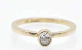 A contemporary 18ct gold and diamond ring