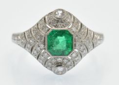 A Platinum Emerald & Diamond Dome Ring