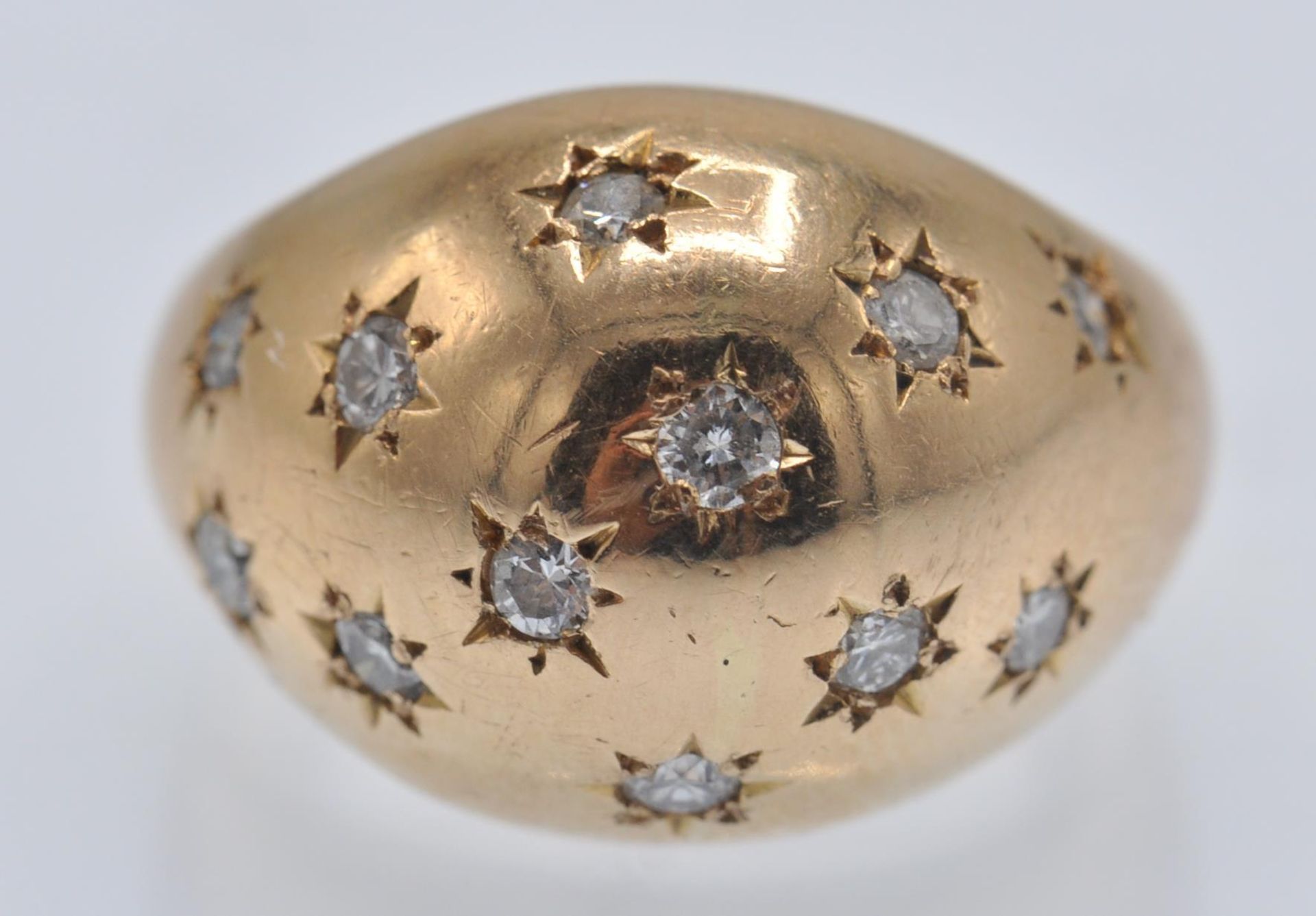 An 18ct Gold & Diamond Bombe Ring