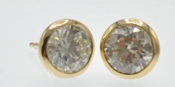 A Pair of 18ct Gold & Diamond Stud Earrings