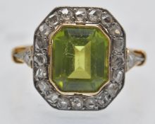 An Antique Peridot & Diamond Cluster Ring