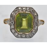 An Antique Peridot & Diamond Cluster Ring