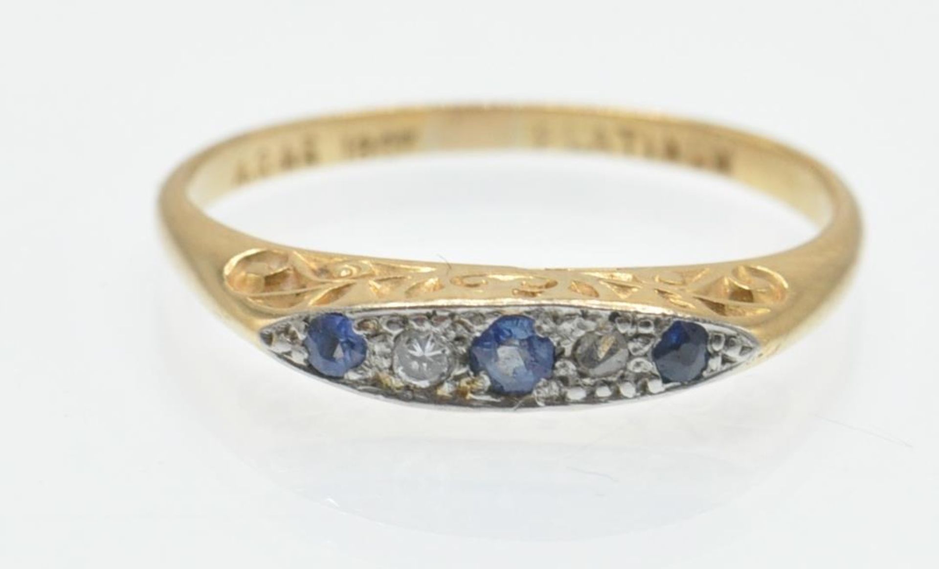 An 18ct Gold Platinum, Sapphire & Diamond Ring