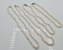 A Collection of Four Vintage Cultured Pearl Necklaces.