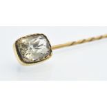 An Antique Gold & Topaz Stick Pin