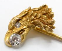 An 18ct gold and diamond figural eagle stick pin.
