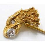 An 18ct gold and diamond figural eagle stick pin.