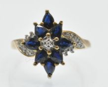 A Hallmarked Sapphire & Diamond Cluster Ring