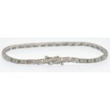 A Gold, Platinum & Diamond Line Bracelet