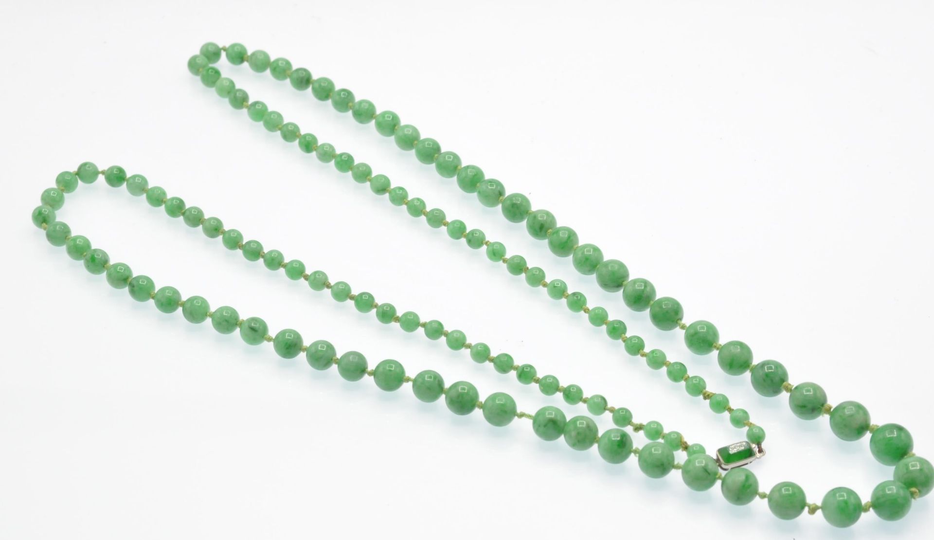 An Antique Jade Bead Necklace