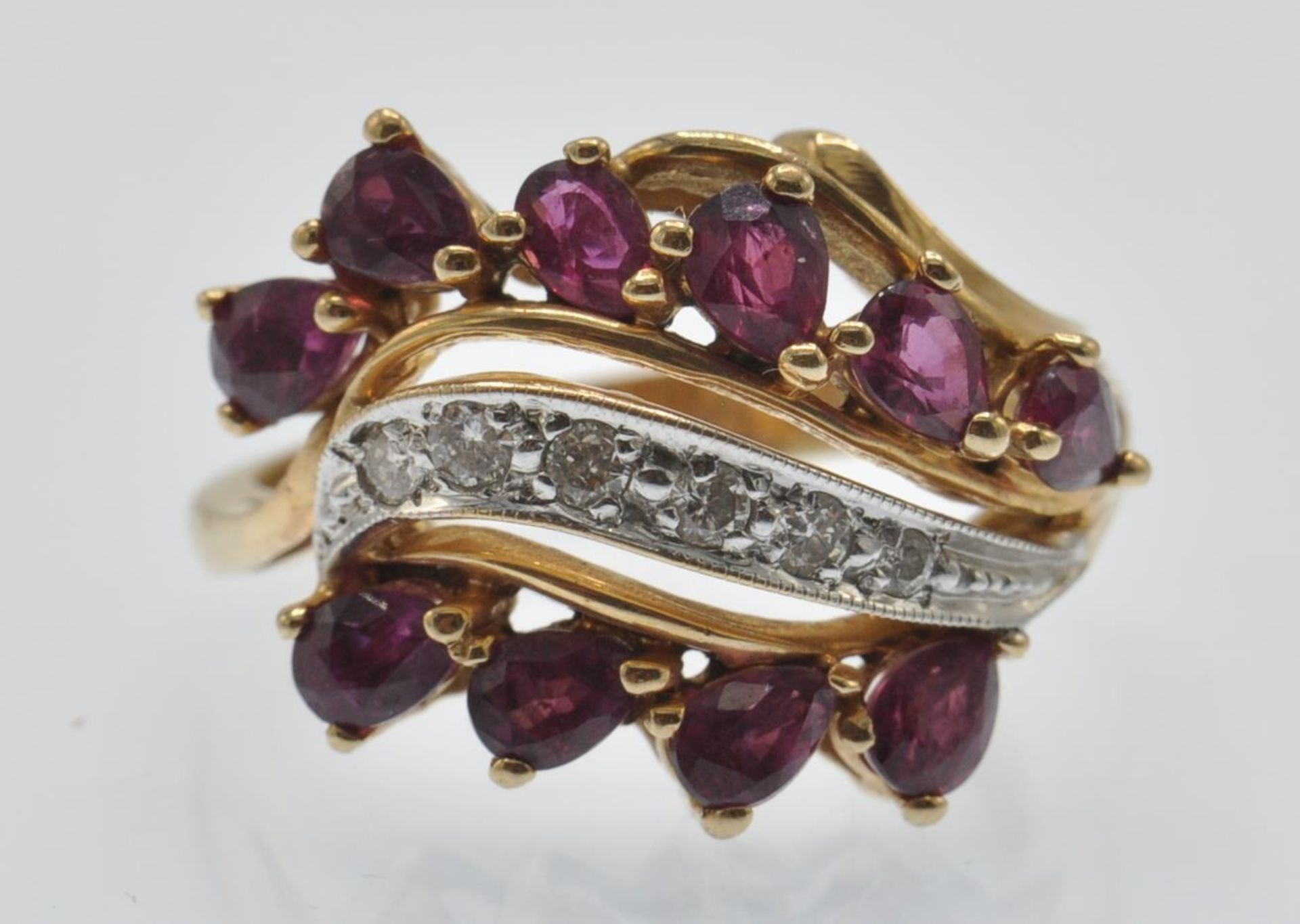 A Hallmarked 14ct Gold Ruby & Diamond Crossover Ring