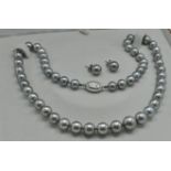 An 18ct White Gold, Diamond, Pearl Necklace & Earrings