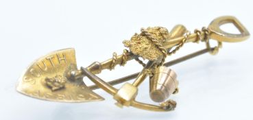 A Victorian South Africa gold rush brooch pin.