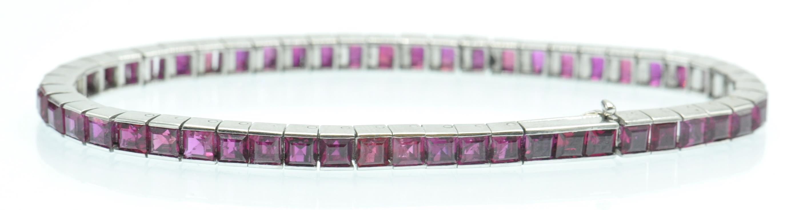 A French 14ct White Gold & Ruby Tennis Bracelet