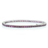 A French 14ct White Gold & Ruby Tennis Bracelet