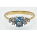 An 18ct Topaz & Diamond Ring