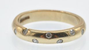 A Hallmarked 9ct Gold & Diamond Band Ring