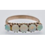 A French Gold & Opal Five Stone Ring