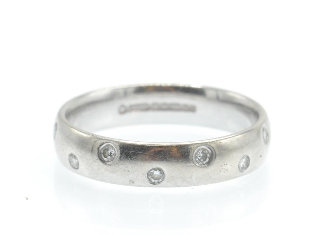 An 18ct White Gold & Diamond Band Ring