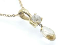 An 18ct Gold & Diamond Pendant necklace