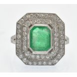 A Platinum Emerald & Diamond Cocktail Ring.