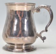 An 18th Century George II mug by Thomas Whipham of