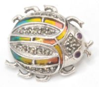 A silver and plique a jour art nouveau style brooc