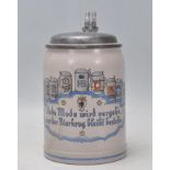 A vintage 20th Century German stoneware beer stein