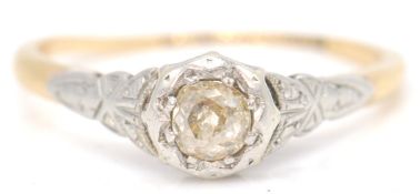 A vintage single stone old cut diamond ring with a