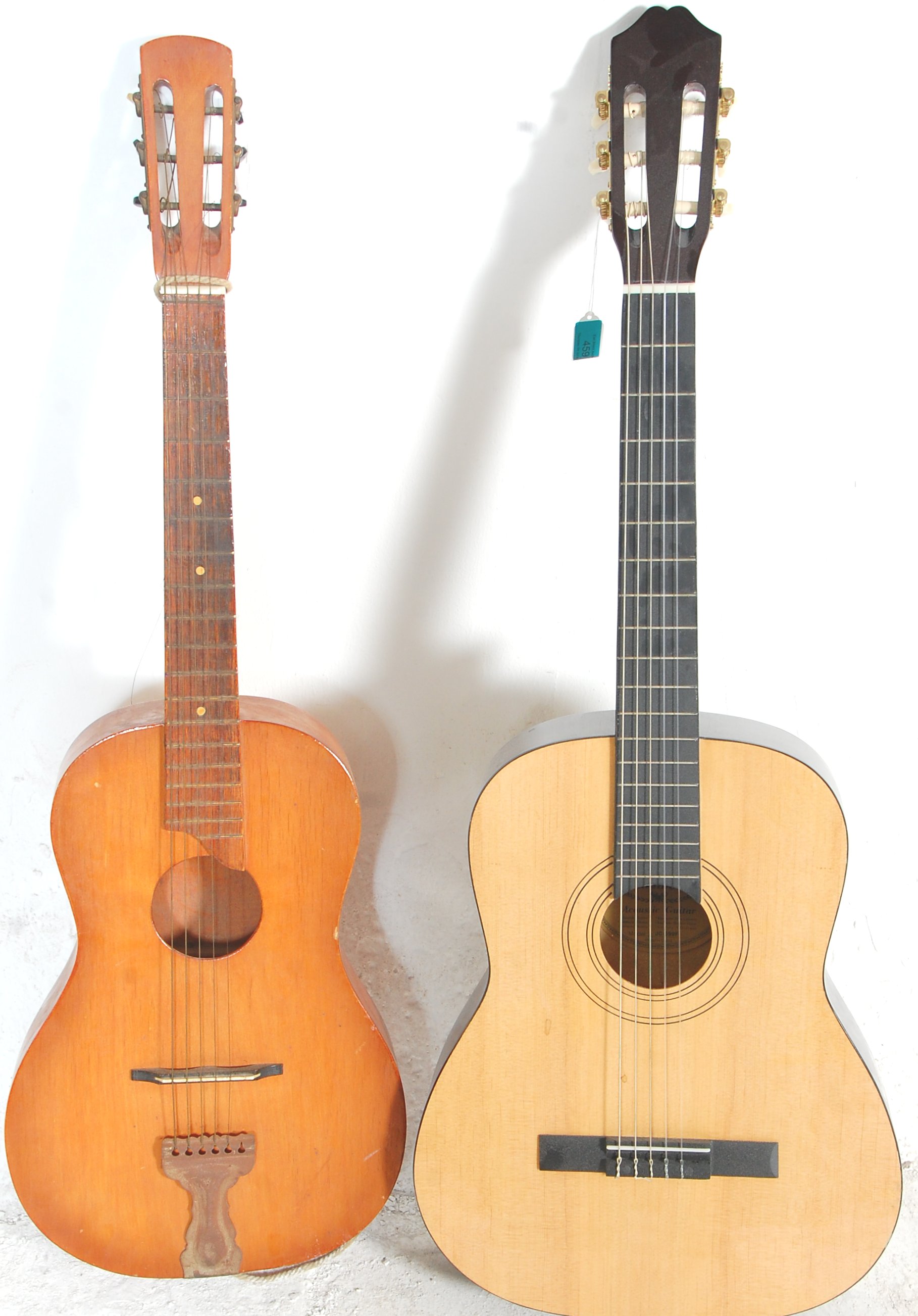 A Burswood made six string acoustic guitar having
