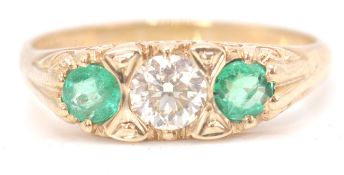 An impressive 9ct yellow gold emerald and diamond