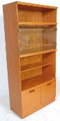 A retro mid 20th Century teak wood room unit havin