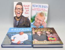 A group of four signed hardback books to include D