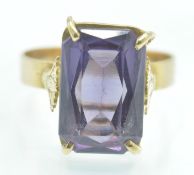 A Gold & Synthetic Colour Change Sapphire Ring